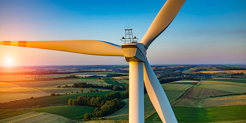 Wind turbine blades, countryside in background